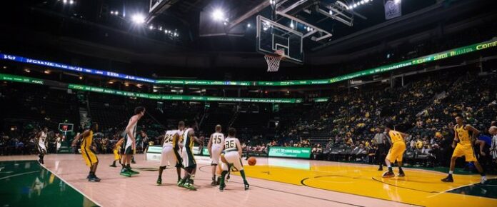Bucks players reacting to a missed shot in disappointment.