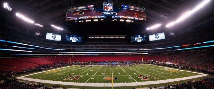 Poker player holding cards at a tournament table.
