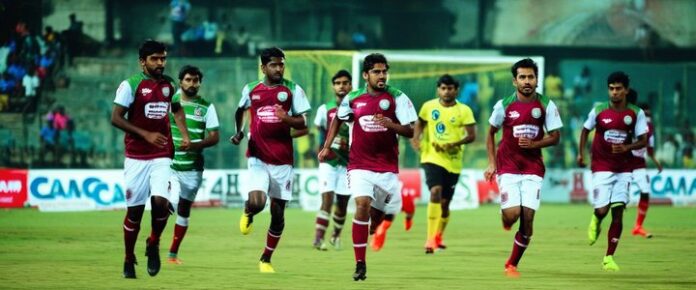 Poker players competing at the Kalinga Super Cup tournament table.