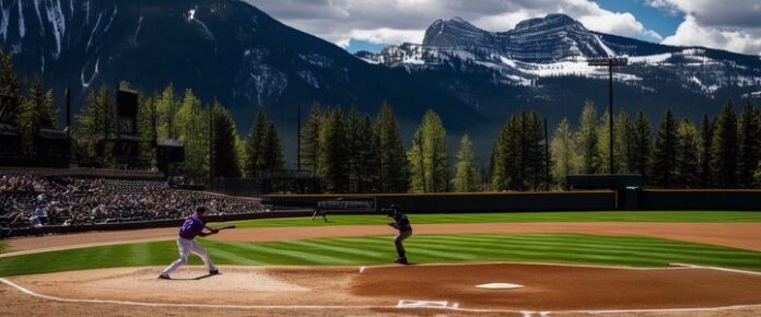 DH Bryant sitting on bench, watching game with injured foot wrapped.