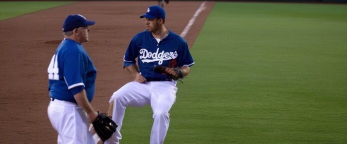 Enrique Hernandez sitting out with a groin injury during a game.