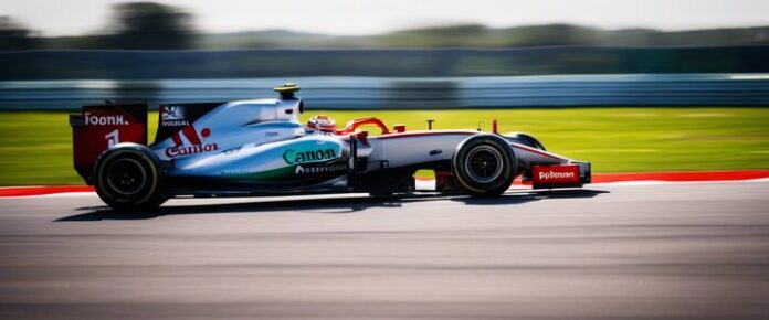 Formula 1 cars racing on a circuit track.