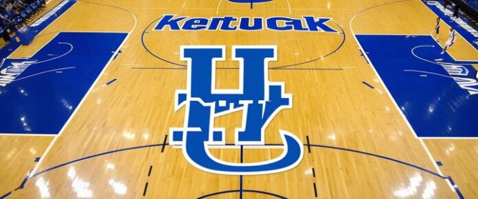 Kentucky Wildcats basketball players in action on the court.