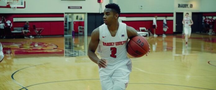 Left-handed high school guard signing with Bradley men's basketball team.