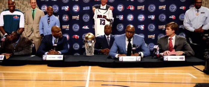 NBA team representatives gather for the draft lottery drawing ceremony.