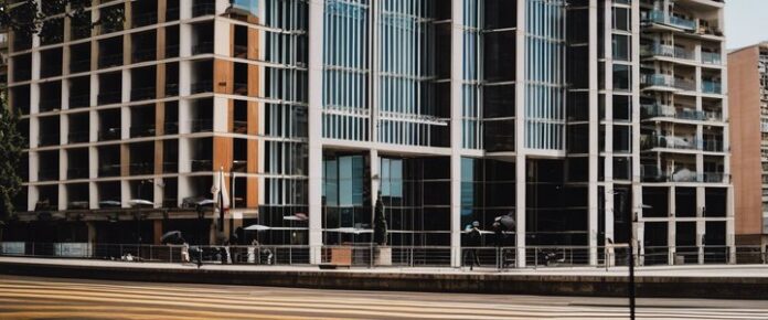 Protesters marching with signs during a large demonstration downtown.
