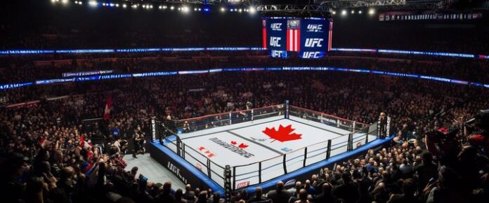 UFC fighters in action at Montreal's Bell Centre arena.